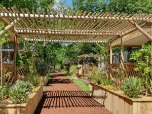 Pergola Nosy-Bé en rondins ajourés